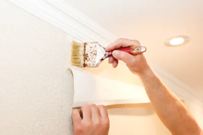 Pose de papier peint aux Monts d'Aunay — revêtements muraux et toiles de verre